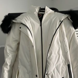 1 Madison white parka with genuine fox fur trim lining the hood. Size Medium.